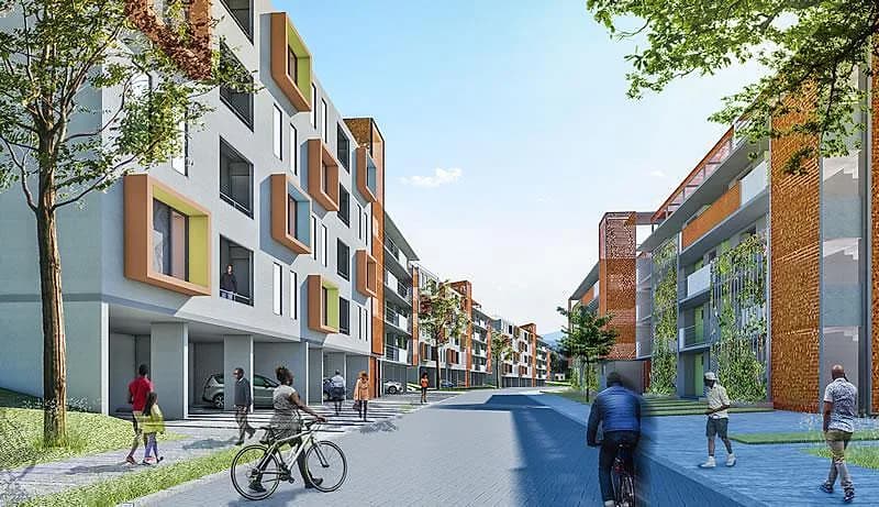 Immeubles d'un écoquartier aux encadrements de baies orange et verts