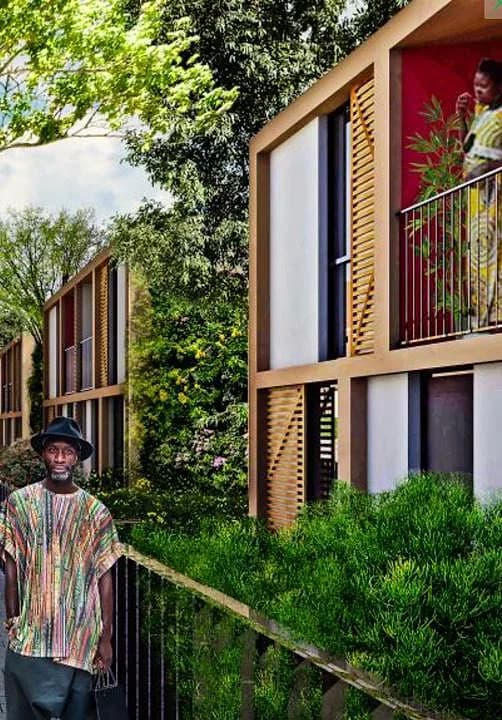Maison de l'écoquartier avec balcon et façade végétalisée